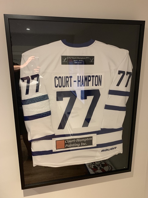 Etobicoke painters sponsor Etobicoke Dolphins girls hockey